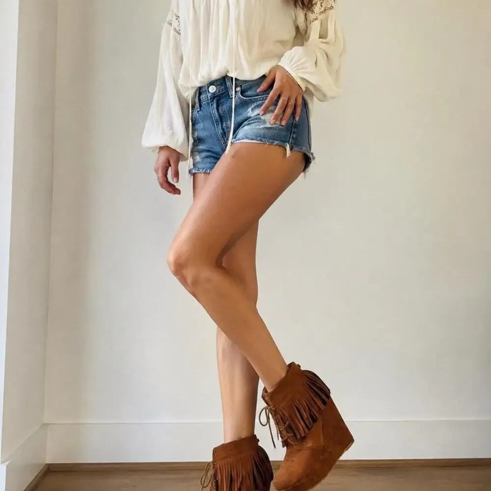 Brown suede fringe boots with
